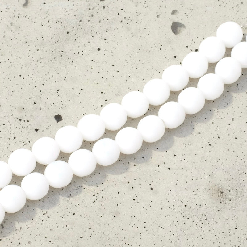 Strand of 6mm round white opaque Bohemian pearls
