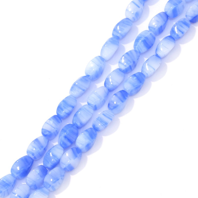Strand of twisted oval Bohemian glass beads, 9x6mm, shades of opaque light blue
