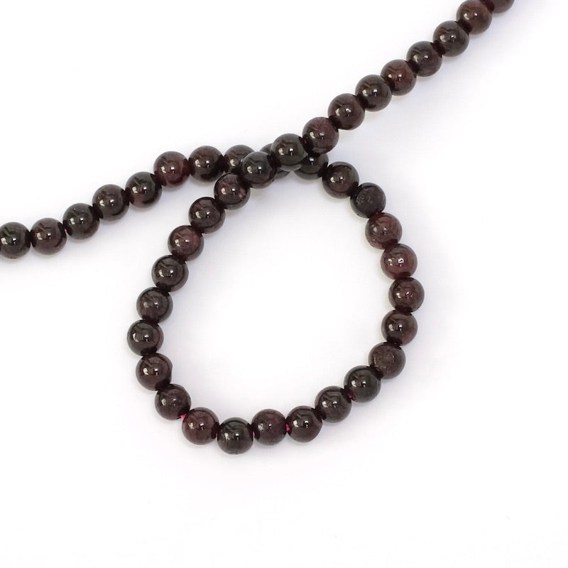 Strand of natural 4mm round garnet beads