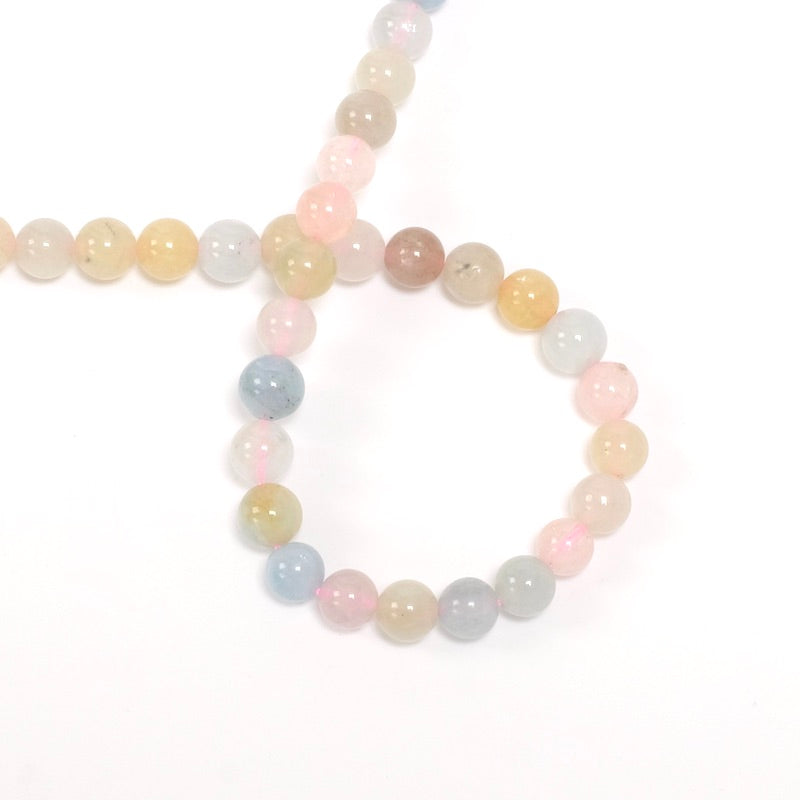 Strand of 6mm round pastel Morganite beads