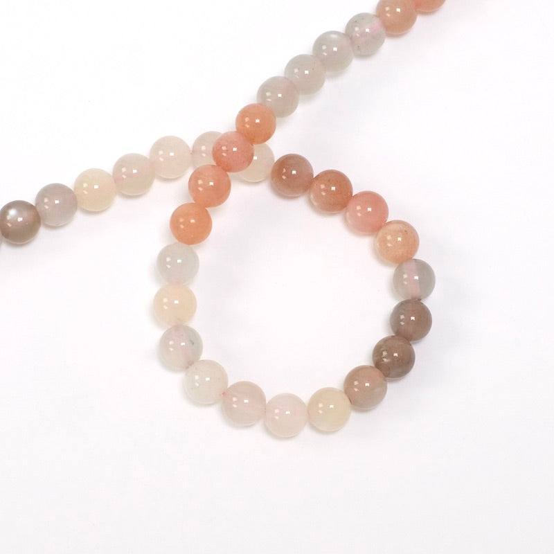 Strand of 6mm White Feldspar and Grey Moonstone round beads