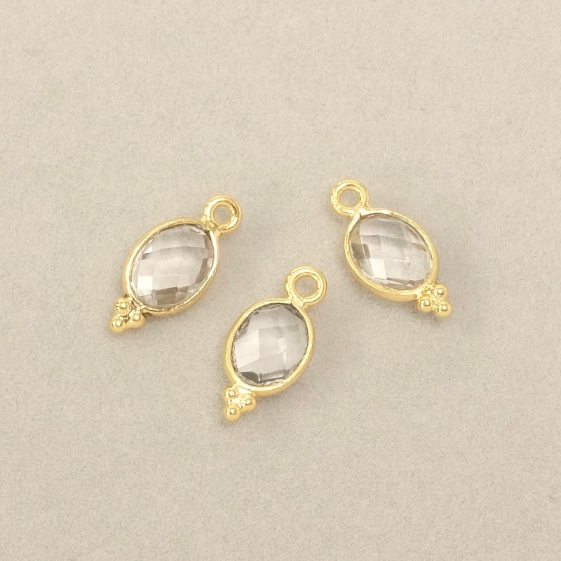 Bohemian-set oval Quartz crystal pendant in 24K gold-plated brass