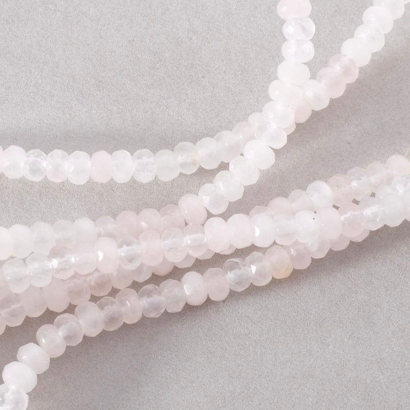 Strand of 4x6mm faceted natural Rose Quartz donut beads