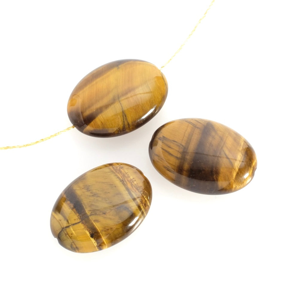 Natural oval flattened 18 x 25mm Tiger's eye bead à l'unité