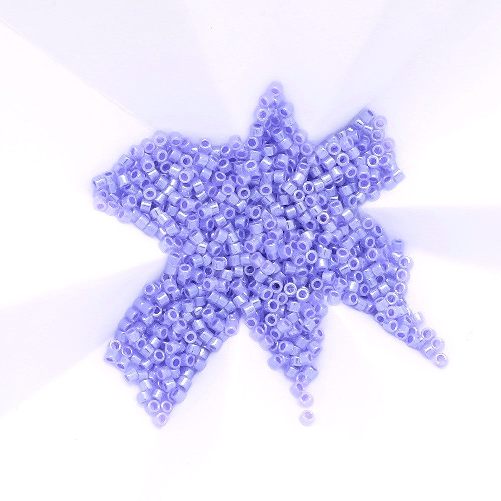 8 grams of Miyuki Délica 11/0 Lined crystal Purple N°249 beads