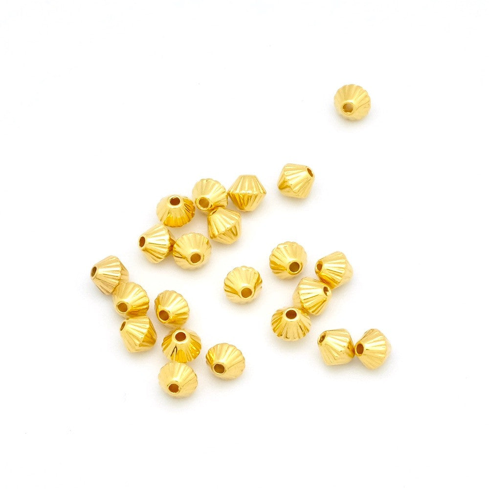 Set of 15 fluted spinning top beads in gold-plated Zamak