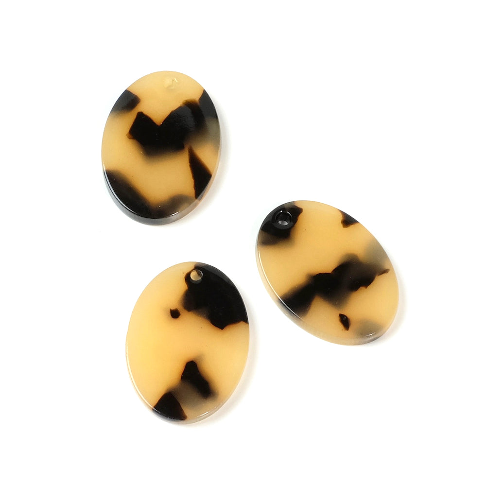 2 small oval pendants in beige acetate