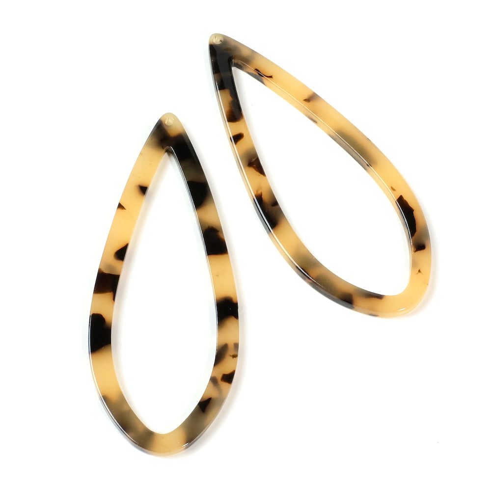 2 beige acetate drop ring pendants