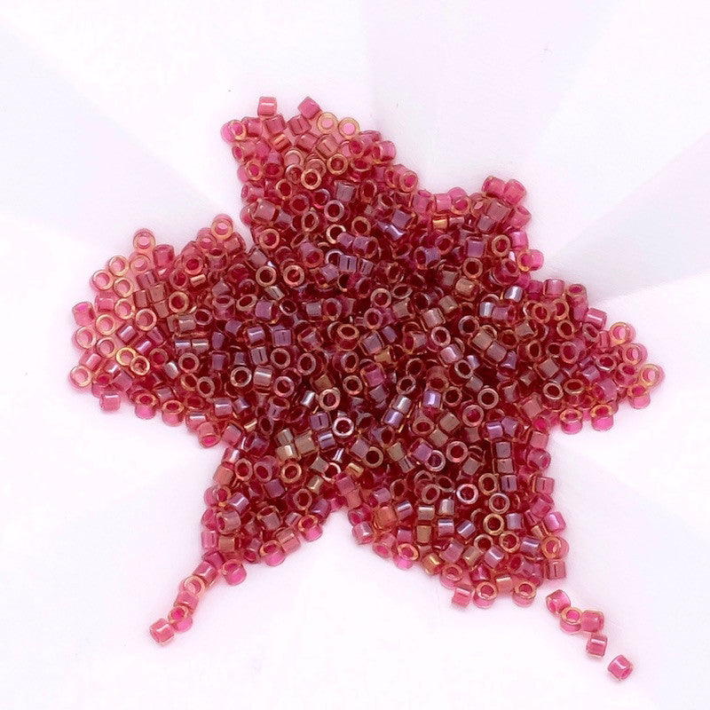 8 grams of Miyuki Délica 11/0 Lined amber vermilion N°282 beads
